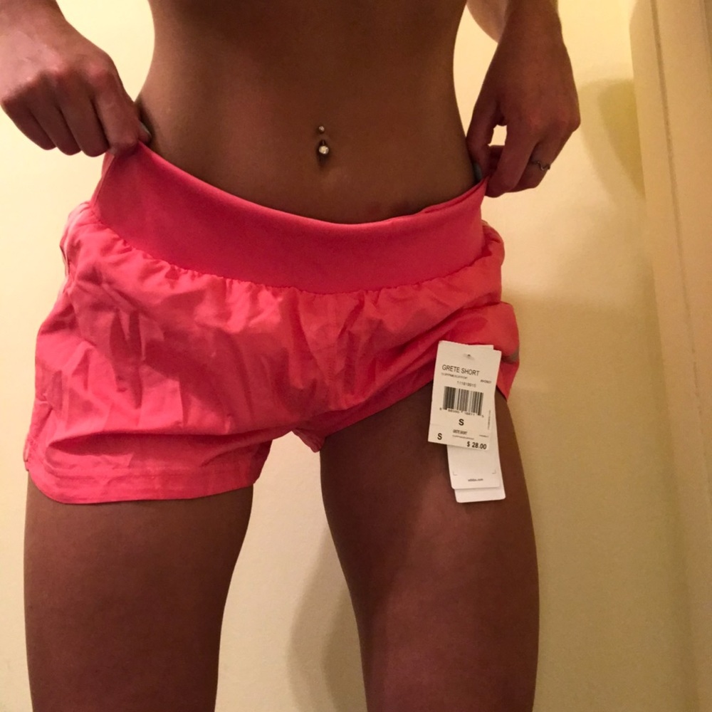 Pink Nike workout shorts